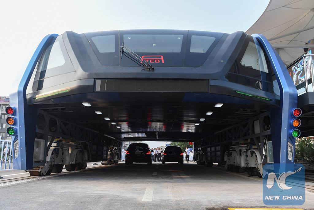 China’s crazy car-straddling elevated bus is just a giant scam, police say