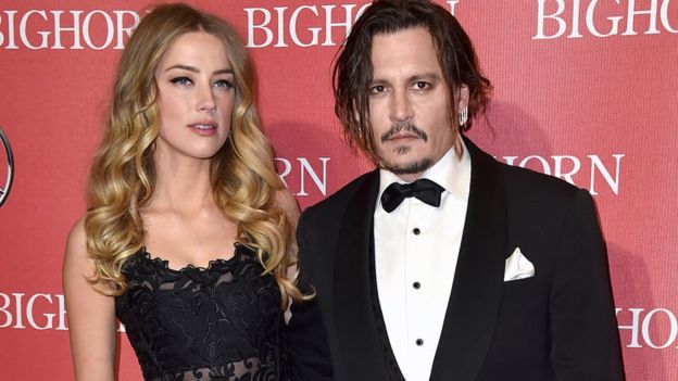 Johnny Depp's wife Amber Heard accuses him of assault